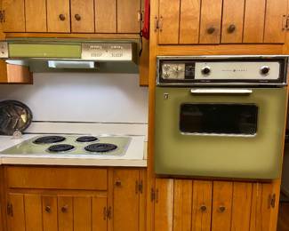 Vintage General Electric avacodo green wall oven and countertop stove and vent hood