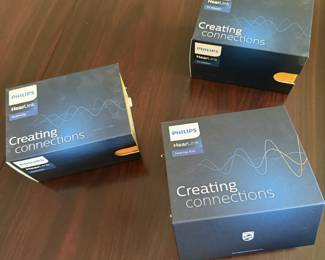 HEARING AIDS AND TWO ADAPTORS