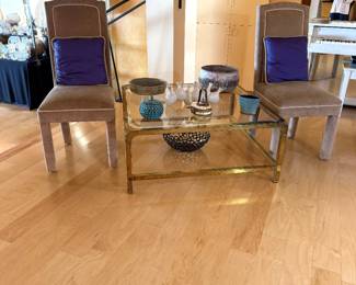 brass and glass coffee table and 2 straight chairs