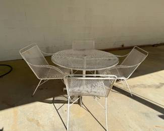 iron table and 4 chairs