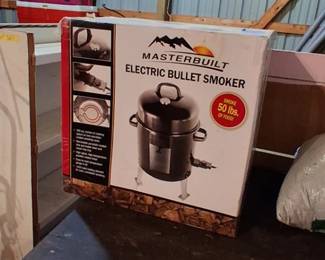 Masterbuilt Electric Bullet Smoker, designed for compact smoking needs. 