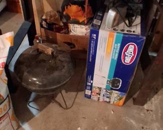 charcoal grill, identified by the "Kingsford" brand