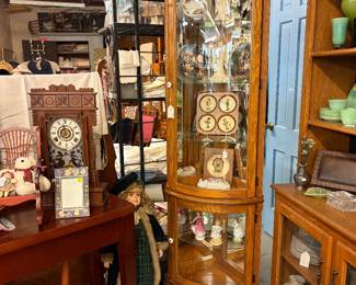 Corner curior  cabinet.  Hummel Collection