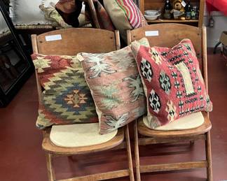 Kilm pillows & wood folding chairs