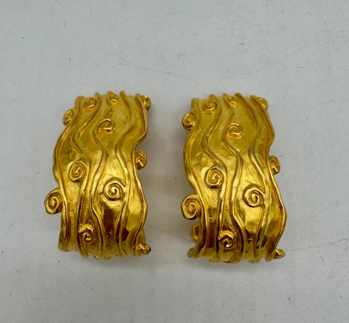 Vintage Karl Lagerfeld wire swirl clip earrings.
