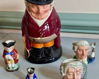 Collection of Toby cups.