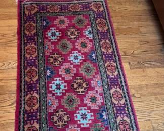 2 Persian scatter rugs.