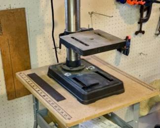 Black and Decker Firestorm drill press.