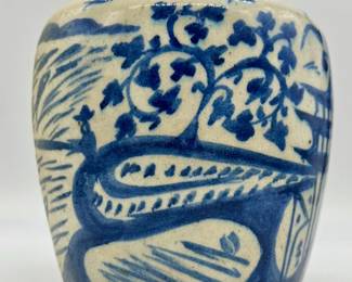 Blue and white hand painted stoneware jar with lid.  