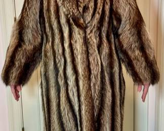 Ladies brown racoon full length fur coat.