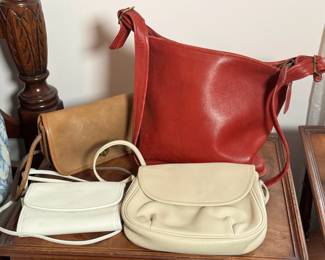 Leather Coach shoulder bags.