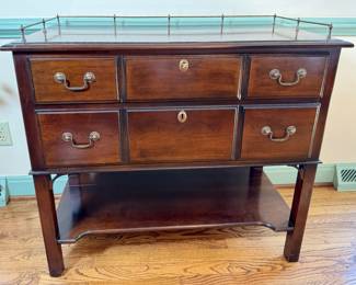 Mahogany silverware chest on stand.