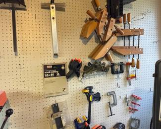Group of vices and saw blades.
