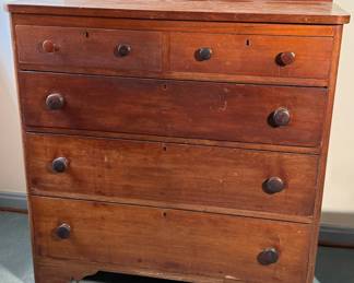 Cherry chest or dresser.