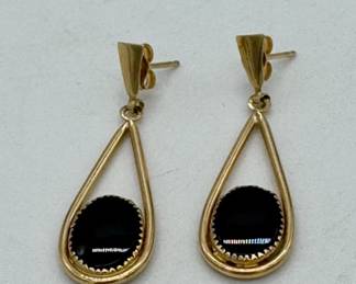 14K yellow gold and onyx post earrings.