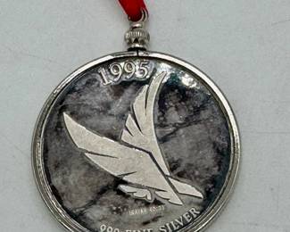 .999 fine silver 1995 Christmas nativity medallion.