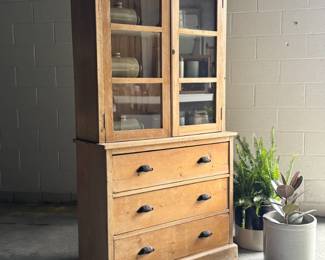 antique english pine housekeeper's cupboard w/ glass doors and three lower drawers