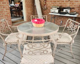 Porch table with 4 chairs. 