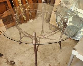 round glass table with metal frame