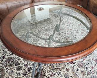 round, glass coffee table with matching end table