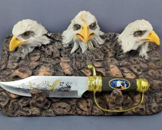 Bald Eagle Themed Fixed Blade Knife, 7.75" Trailing Point Blade, On Dimensional Resin Wall Display With 3 Eagle Heads