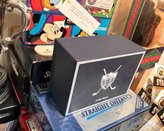 Wilson Staff golf balls and Disney box lot