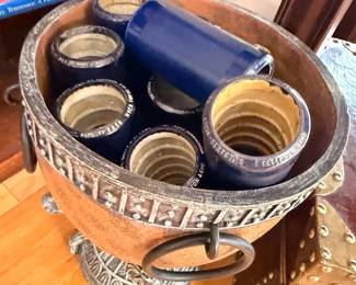 Terracotta jardiniere with stoneware crocks