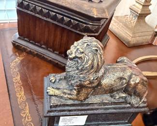 Bronze reclining lion statuette and carved wood lidded box