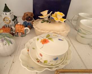 Floral porcelain covered casserole with teapot and figural decor