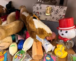 Mixed vintage plush toys, Babar, Pooh, and novelty items