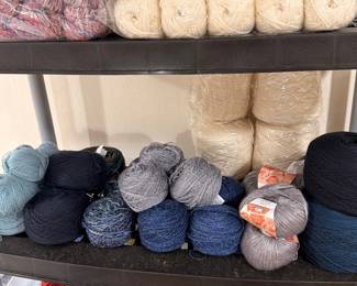 Yarn collection on tiered shelf