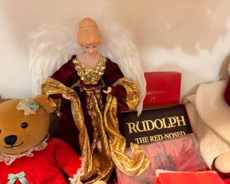 Christmas angel tree topper with Rudolph book