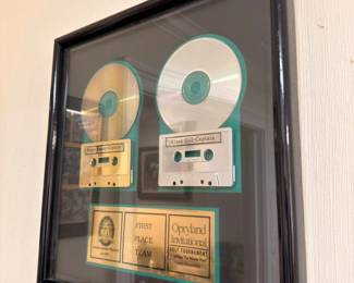 Framed Opryland music award with gold record