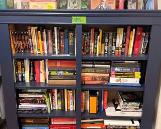 Bookcase filled with hardcover and paperback books