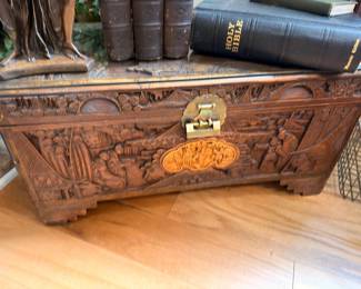 Heavily carved antique wooden trunk chest
