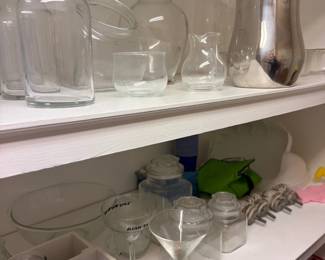 Glass vases, pitchers, barware shelf