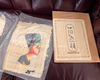 Egyptian papyrus paintings Nefertiti and hieroglyphics