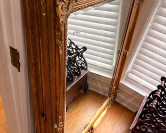 Large ornate gold gilt framed mirror