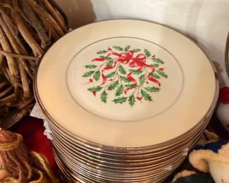 Stack of Christmas holly holiday dinner plates