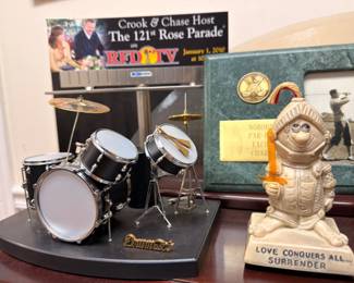 Miniature drum kit with Crook and Chase Rose Parade plaque