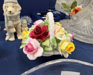 Porcelain rose bouquet figurine and dog figurine