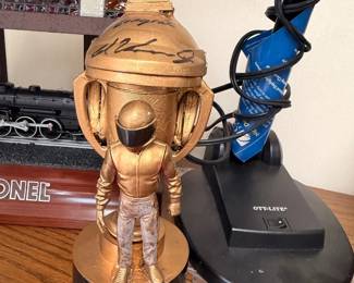 Signed racing trophy and landline phone