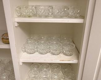 Cabinet of pressed glass cups and bowls