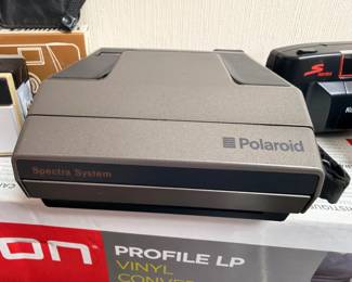 Polaroid Spectra System camera and vinyl converter