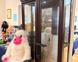 Mahogany glass-front gun display cabinet
