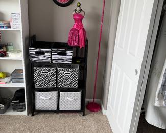 hot pink floor lamp and a miniature mannequin styled in a matching hot pink sequin dress