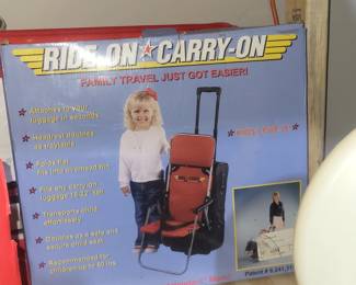 Ride-on Carry-On toddler travel seat designed to attach to standard carry-on luggage