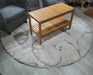bench with a lower slatted shelf