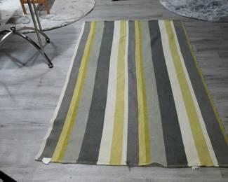 yellow, gray, and white striped area rug