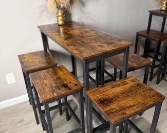 rustic brown and black industrial bar table and stool
